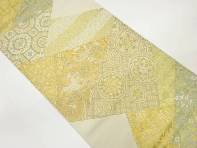 切り嵌め風華紋に孔雀・花唐草模様織出し袋帯